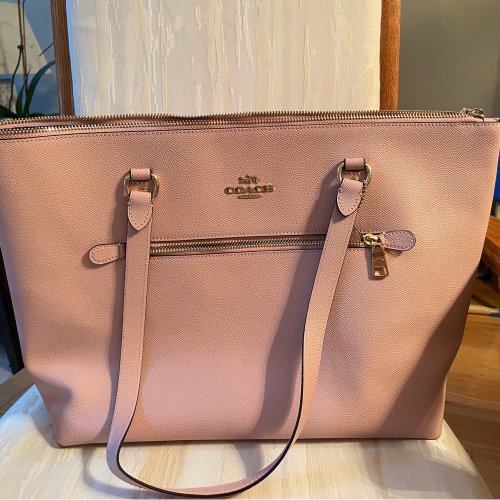 Coach Tote Bag. Color is light pink.  Hardly used. Excellent condition